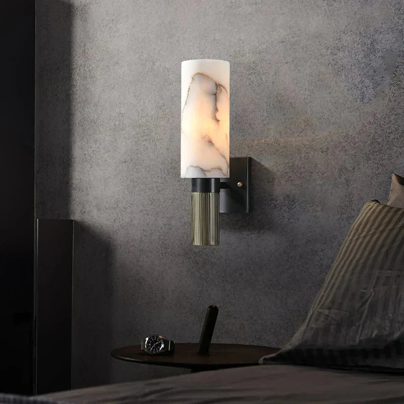 Modern wall lamp with an alabaster shade and brass details