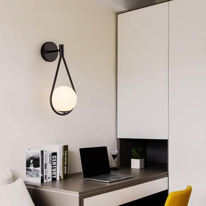 Loop Brass and Sphere Sconce